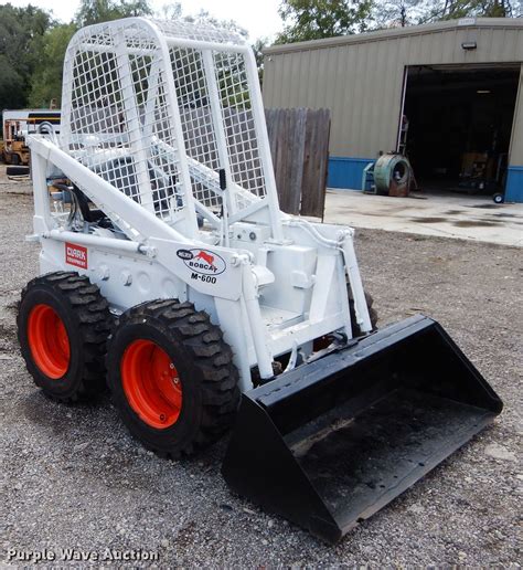 melroe 600 skid steer|melroe skid steer attachments.